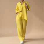 Yemelia yellow linen blend relaxed button-down shirt and wide-leg pants set with drawstring waist.